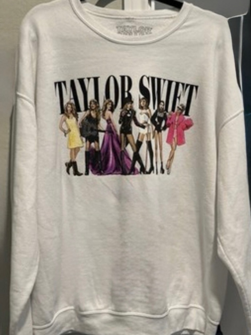 Taylor Swift Eras Tour white crewneck sweatshirt representing album eras. M